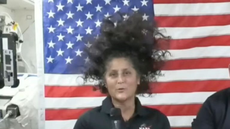 Suni Williams shows off her space hair during news conference in July. Pic: AP